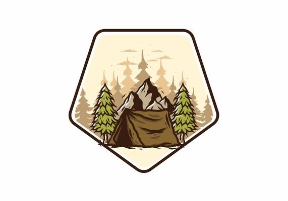 Camping tent in front of the mountain and between pine trees