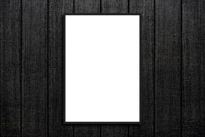 Mock up blank poster picture frame on wood wall photo