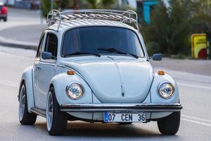Side, Turkey, March 02, 2022-Vintage white car Volkswagen Beetle photo