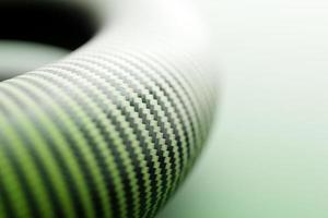 Ilustración 3d de arco monocromático de carbono verde, forma inusual. patrón de formas geométricas simples, fondo de mosaico. foto