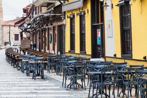 Side Turkey  February 20 2022   Atmospheric summer photography. Wooden cafe chairs , table. Outdoor street cafe photo