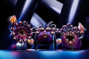 Evil pink cartoon monsters with a huge number of eyes, sight eyes, dangerous sting weapons are ready to attack. 3d illustration photo