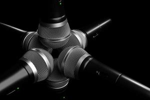 Microphones, round shape model on black background, realistic 3D mockup. music award, karaoke, radio and recording studio sound equipment photo