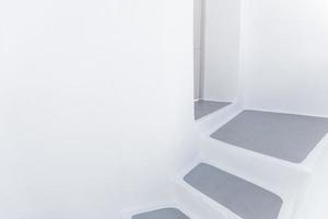 Famous white stairs on the island of Santorini. White minimal as travel background concept photo