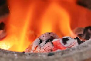 Close up coals in the fire photo