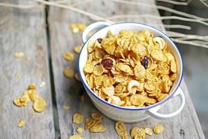 Close up honey caramel cornflakes with raisins and cashews photo