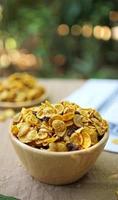 Close up honey caramel cornflakes with raisins and cashews photo