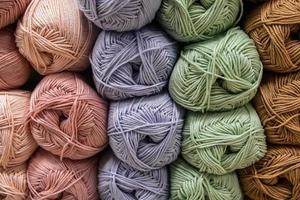 Background from multi-colored fluffy woolen threads for knitting. photo