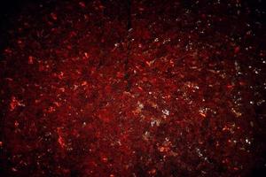 Space abstract background. Christmas backdrop. Texture of red shiny crystals. photo