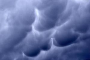 Heavy thunderstorm blue clouds Mammatus cloud photo
