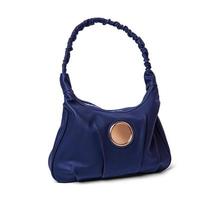 Women's blue leather handbag isolated on white background photo
