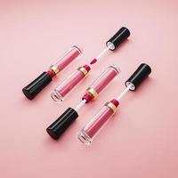 Liquid lipstick and applicator Set on pink color background. Open tube of lip gloss and wand brush on pastel coral surface. Top view, flat lay 3d illustration photo