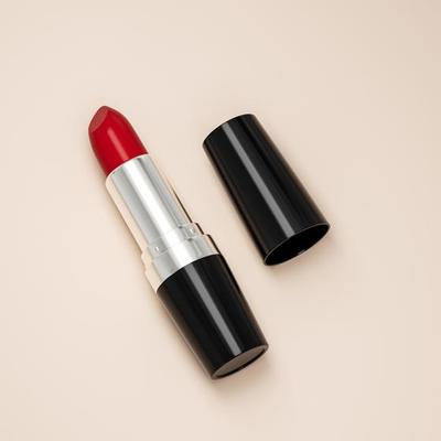 Fashion Red lipsticks on beige background flat lay top view copy space.  Beauty and cosmetics background. makeup, women's lipstick, beauty brand,  product design 3d illustration 8163050 Stock Photo at Vecteezy