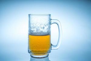 beer bubbles on a clear glass white background in the studio photo