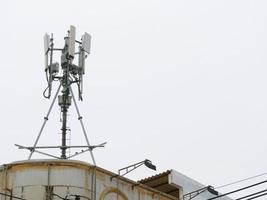 Telephone towers installed on the building. photo