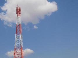 Telephone towers used to broadcast signals at dusk. photo