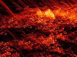Fire flames with sparks on a black background.By shooting at high speed. photo