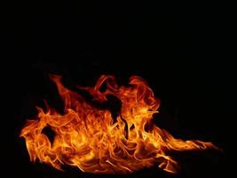 Abstract black flame flame texture, perfect for banners or advertisements. photo