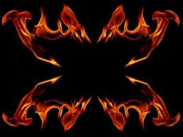 A beautiful flame shaped as imagined. like from hell, showing a dangerous and fiery fervor, black background photo