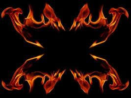 A beautiful flame shaped as imagined. like from hell, showing a dangerous and fiery fervor, black background photo