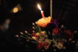 Loy Krathong festival at night in Thailand photo