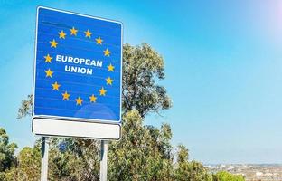 Road sign on the border as part of an European Union member state photo