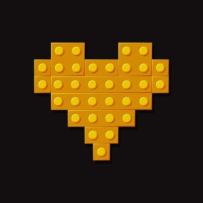 Golden heart. Block plastic toys.  Constructor. Symbol of love. Vector cartoon illustration