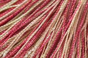 background of multicolored threads photo