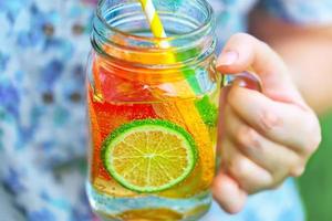 Fruit lemonade in jar photo