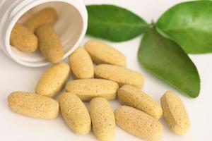 Herbal medicine in capsules photo