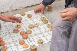 People play a board game photo