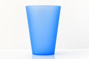 plastic cup on white background photo