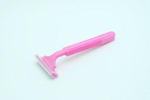 Pink Razor isolated on white background photo