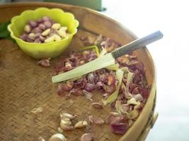 peeling onions and garlic for cooking ingredients photo