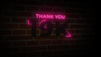 gracias 19k seguidores letrero de neón realista en la animación de la pared de ladrillo video