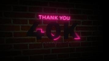 obrigado 40k seguidores sinal de brilho de néon realista na animação da parede de tijolos video
