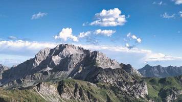 Time-lapse of dissolving clouds in the mountains video