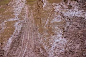 Tire tracks on  muddy. photo