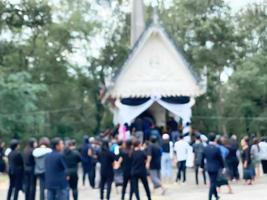 The image is blurred. The funeral of Buddhism in the process of cremation at the cremation area, or what Thai people call the crematorium photo