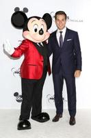 LOS ANGELES   OCT 6 - Mickey Mouse, Skylar Astin at the Mickey s 90th Spectacular Taping at the Shrine Auditorium on October 6, 2018 in Los Angeles, CA photo