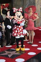 LOS ANGELES   JAN 22 - Mickey Mouse, Katy Perry, Minnie Mouse at the Minnie Mouse Star Ceremony on the Hollywood Walk of Fame on January 22, 2018 in Hollywood, CA photo