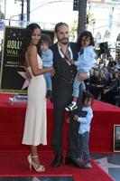 LOS ANGELES  MAY 3 - Zoe Saldana, Marco Perego, sons at the Zoe Saldana Star Ceremony on the Hollywood Walk of Fame on May 3, 2018 in Los Angeles, CA photo