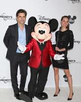 LOS ANGELES OCT 6 - John Stamos, Mickey Mouse, Caitlin McHugh at the Mickey s 90th Spectacular Taping at the Shrine Auditorium on October 6, 2018 in Los Angeles, CA photo