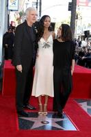 LOS ANGELES - MAY 3  James Cameron, Zoe Saldana, Mila Kunis at the Zoe Saldana Star Ceremony on the Hollywood Walk of Fame on May 3, 2018 in Los Angeles, CA photo