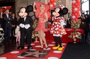 LOS ANGELES   JAN 22 - Mickey Mouse, Katy Perry, Minnie Mouse at the Minnie Mouse Star Ceremony on the Hollywood Walk of Fame on January 22, 2018 in Hollywood, CA photo