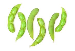 Green soy beans on white background. Top view. photo