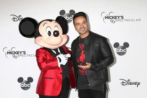 LOS ANGELES   OCT 6 - Mickey Mouse, Luis Fonsi at the Mickey s 90th Spectacular Taping at the Shrine Auditorium on October 6, 2018 in Los Angeles, CA photo