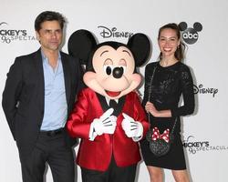 LOS ANGELES OCT 6 - John Stamos, Mickey Mouse, Caitlin McHugh at the Mickey s 90th Spectacular Taping at the Shrine Auditorium on October 6, 2018 in Los Angeles, CA photo