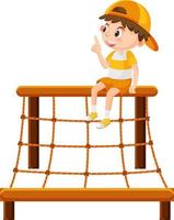 Boy sitting on climbing rope wall net playground vector