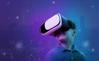 Boy with VR glasses in a metaverse environment concept. Purple background with net threads and outlines of the futuristic city of the future. photo